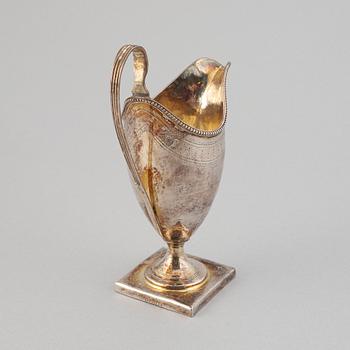 A silver creamer, indistinct makers mark, London, 1791.