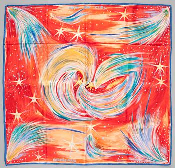 437. A silk scarf "Feux de Ciel" by Hermès.