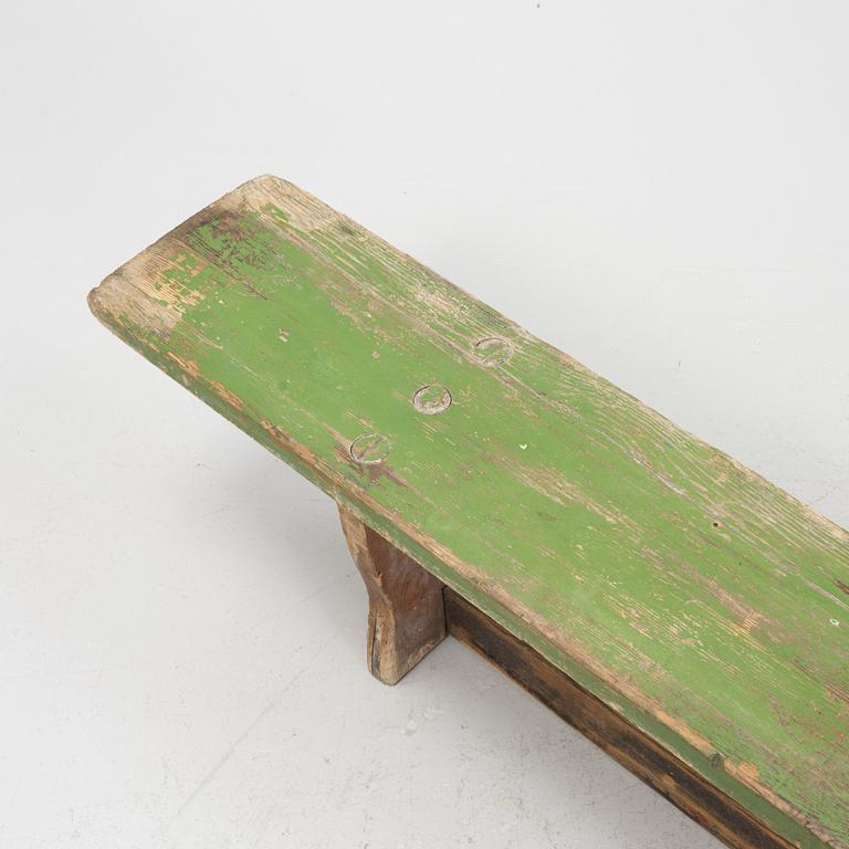 A painted bench, 20th Century.