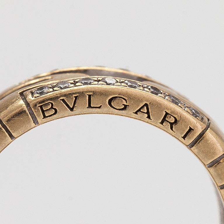 Bulgari, an 18K gold 'Parentesi' ring with diamonds, ca 0.25 ct in total.