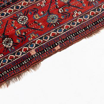 An antique Khamseh carpet, South Persia, ca 485,5 x 179-185 cm.