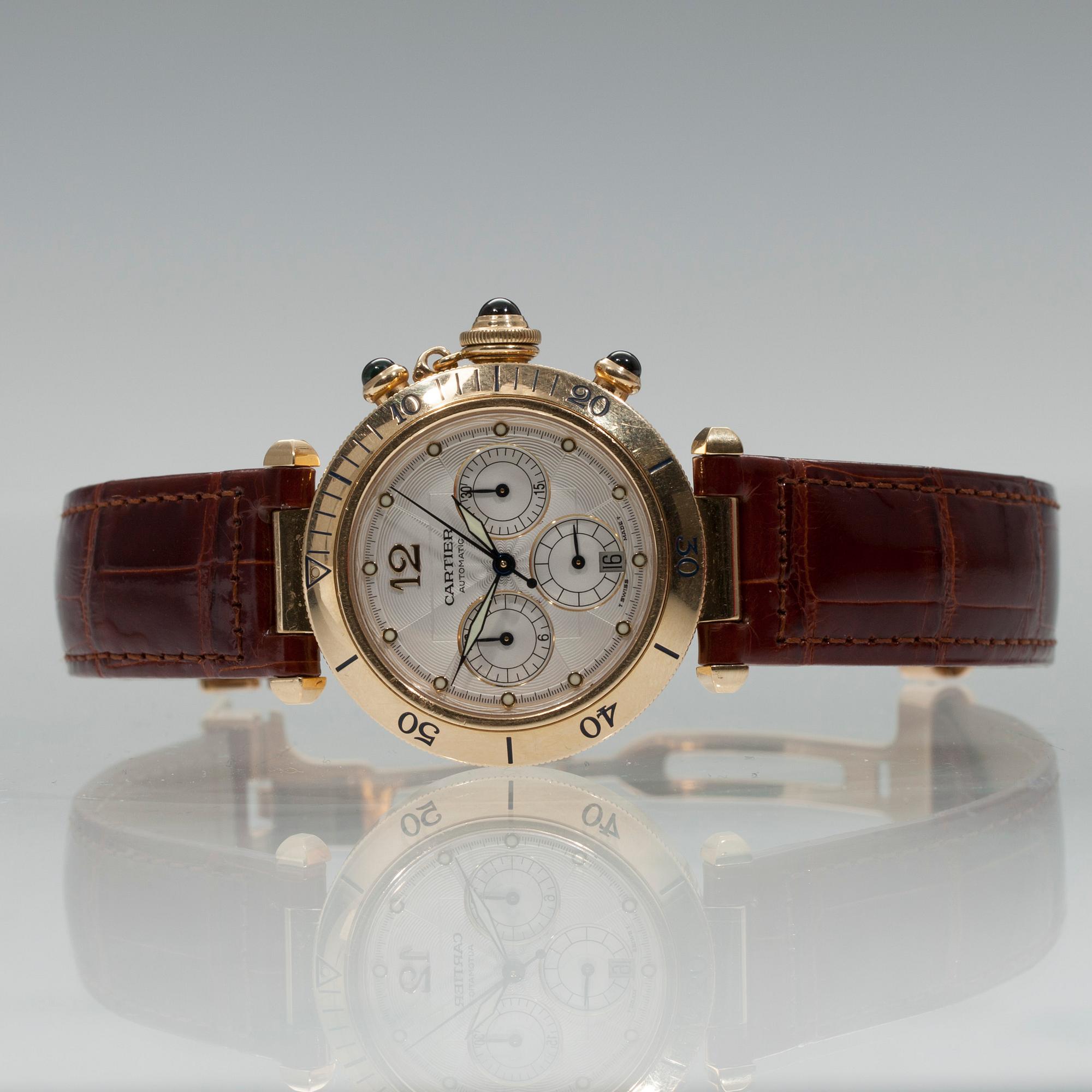 ARMBANDSUR, herr, Cartier Pasha Chrono, 18K guld, original l
äder armband 1999.