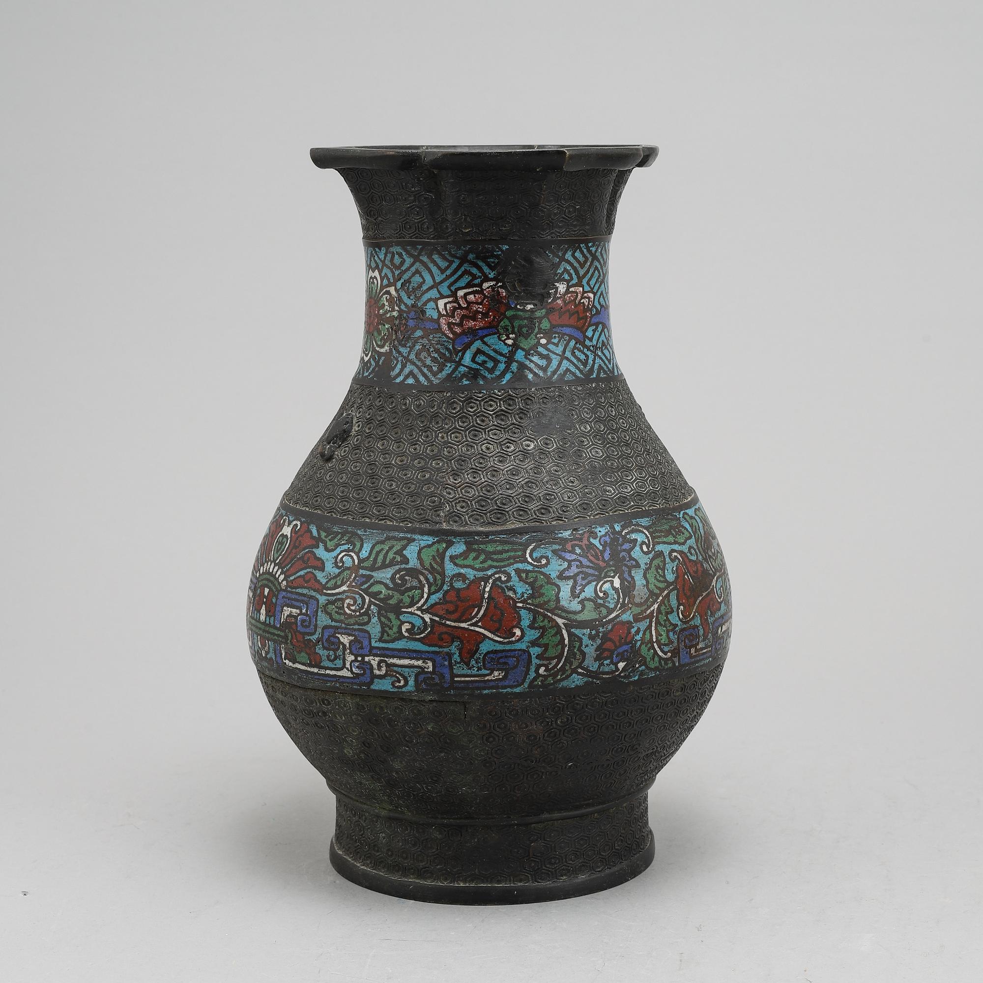 A Chinese bronze and cloisonné vase, around the year 1900.