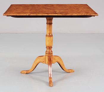 Two matched Swedish first halft 19th Century tilt-top tables by L. E. Lindell.