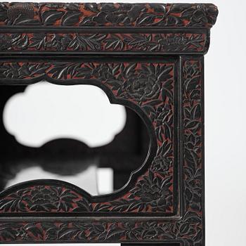 A lacquer display cabinet, late 19th century.