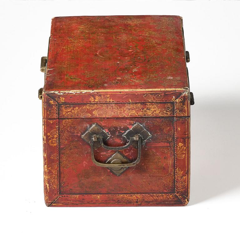 A set of two gilt decorated leather clad wooden chests, late Qing dynasty.