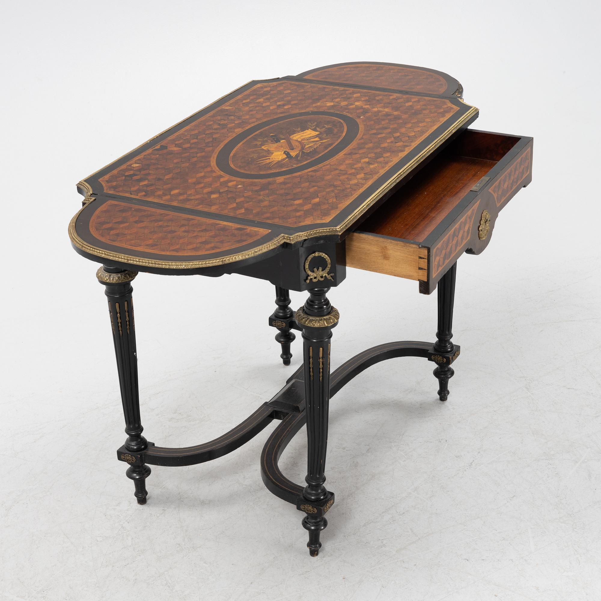 A Louis XVI style table, second half of the 19th century.
