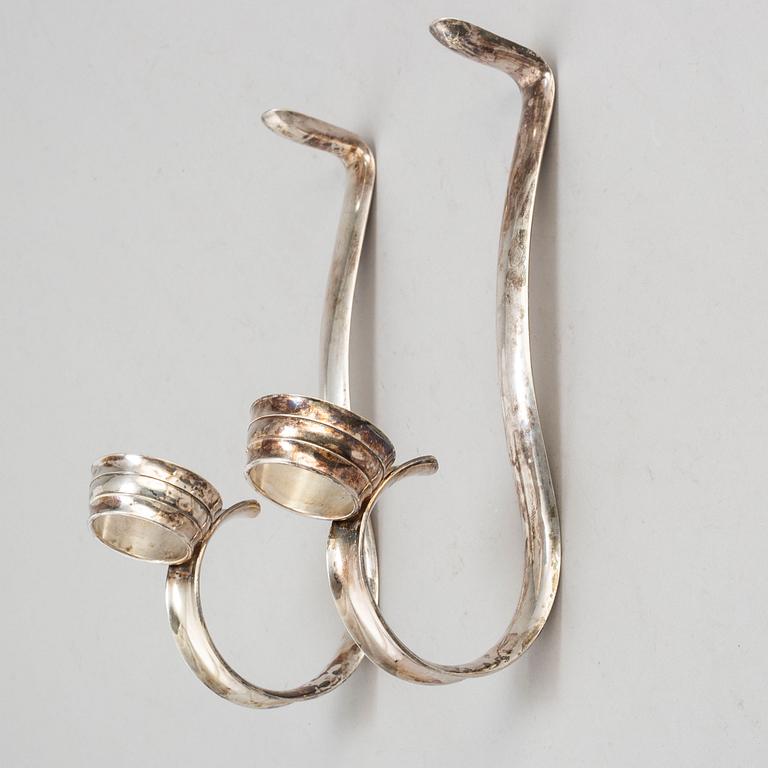 A pair of 20th century silver plated bottle holders.