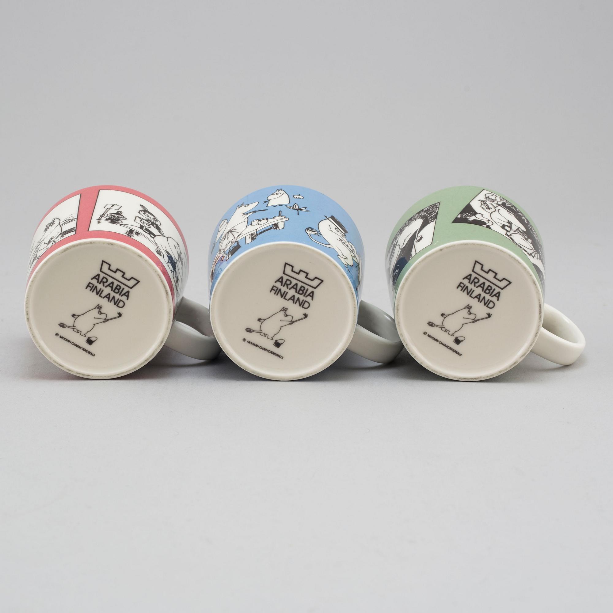 Three porcelain mugs by Arabia, Finland, with Moomin characters, 1990.