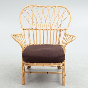 Josef Frank, armchair with footstool, model 311, Firma Svenskt Tenn.