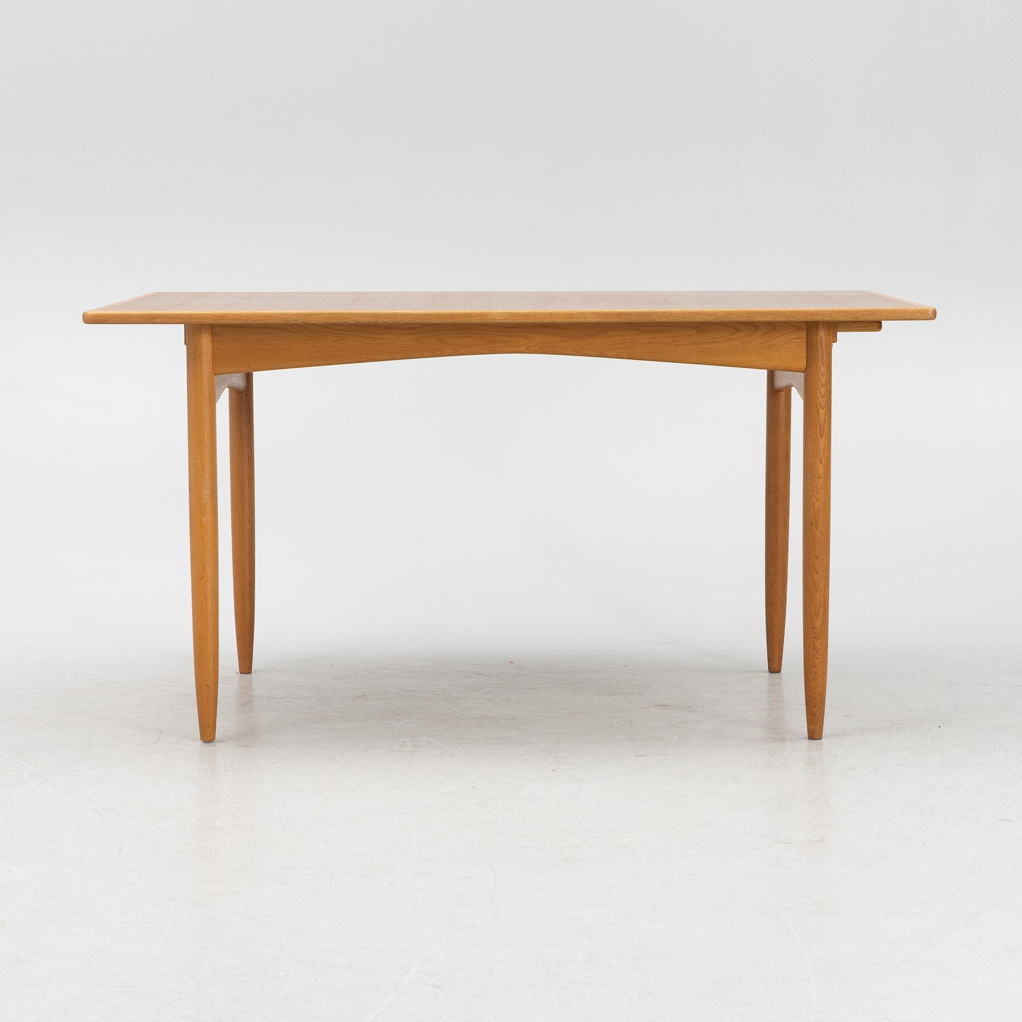 A teak and oak dining table, Scandinavia, 1960's.