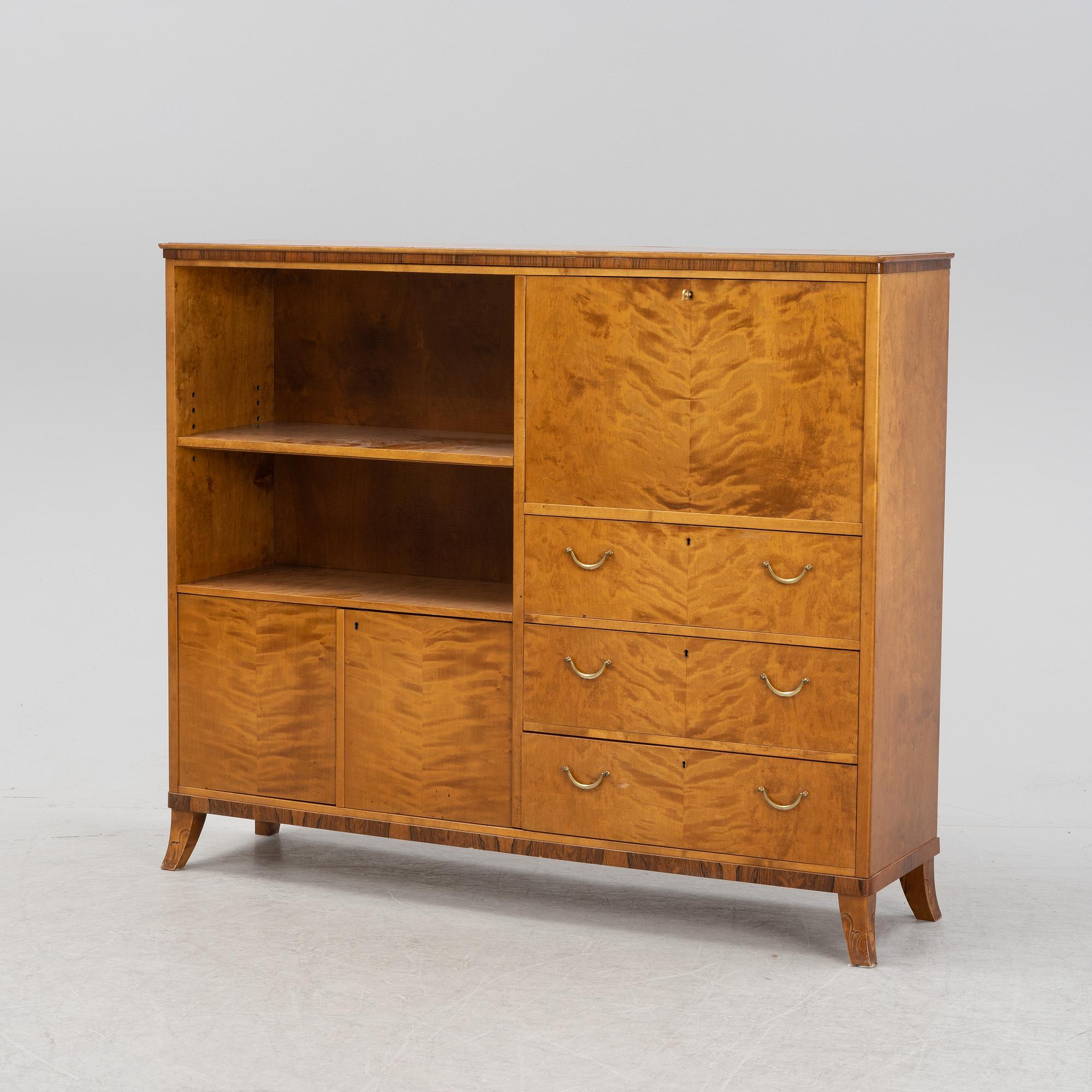A birch and rosewood veneered bookcase, 1940's.