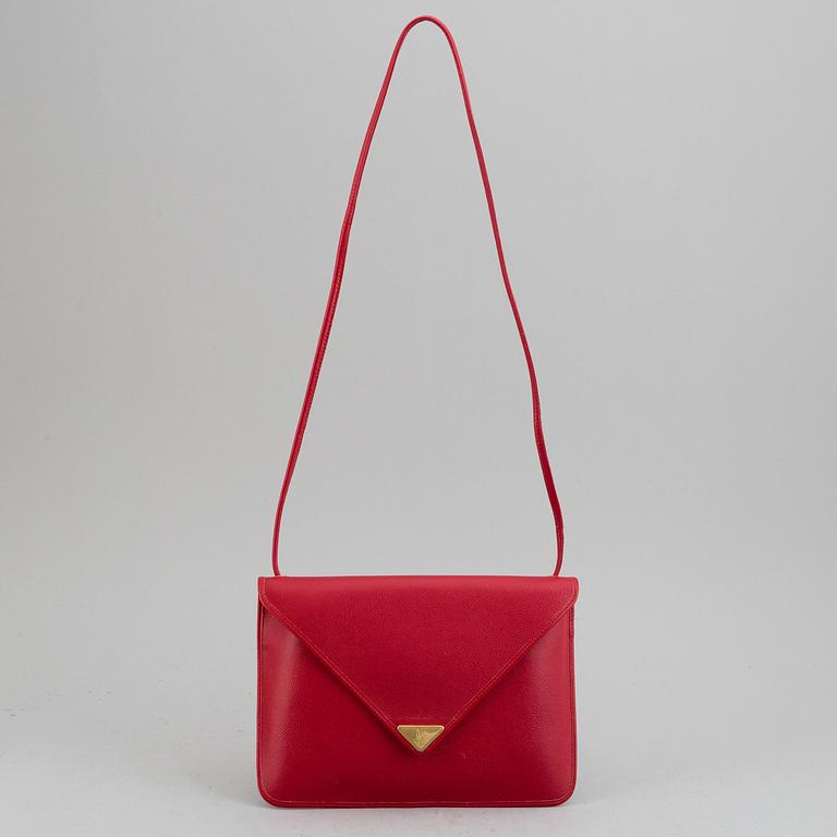 YVES SAINT LAURENT, a red leather bag.