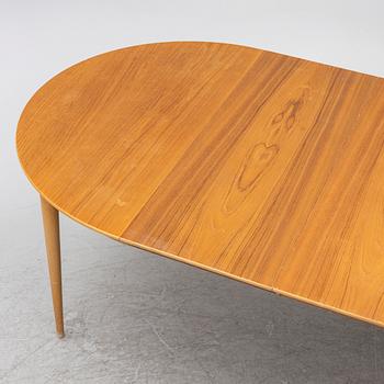 Dining table, mid-20th century.