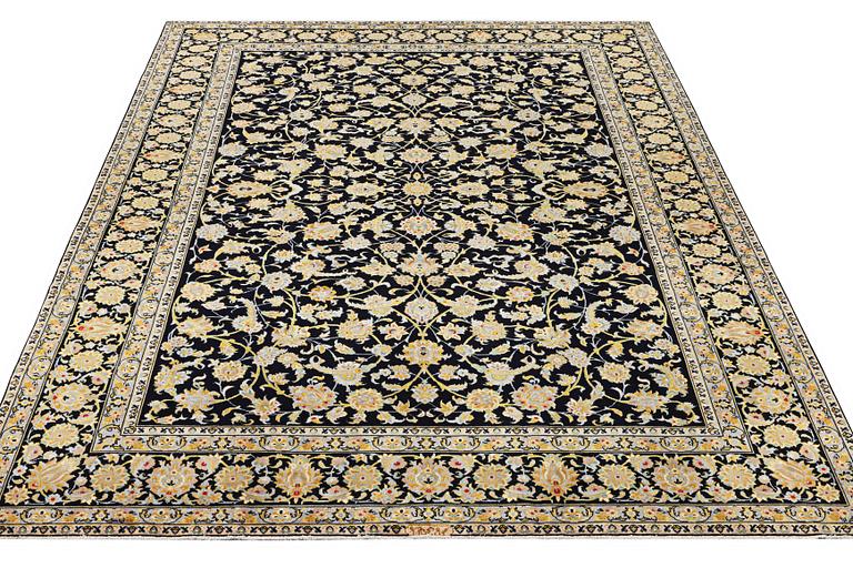 A Kashan carpet, c. 363 x 247 cm.