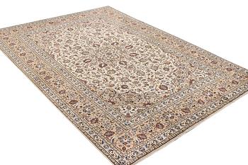 A Keshan carpet, c. 348 x 240 cm.