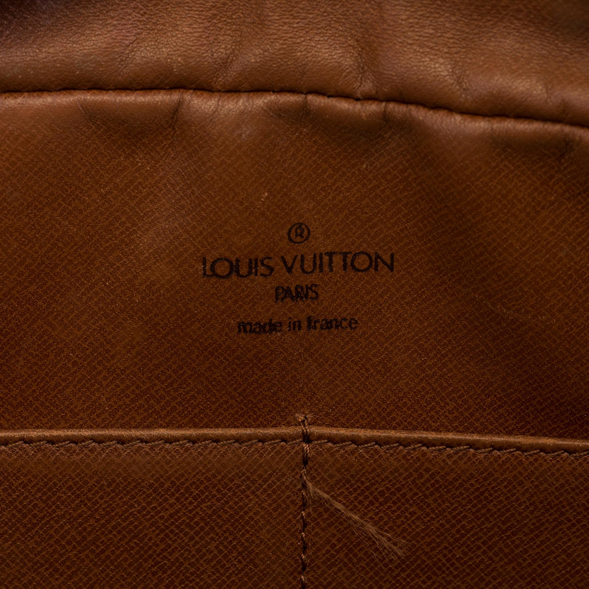 A bag by Louis Vuitton.