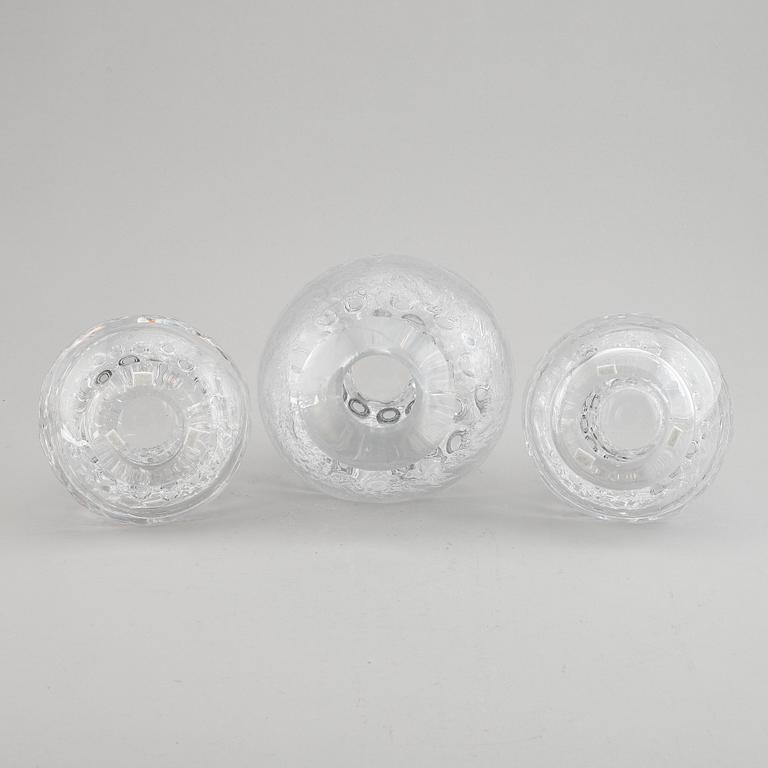 Göran Wärff, a set of three clear glass candleholders. Kosta, Sweden.