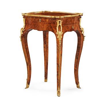 1357. A Louis XV-style late 19th century table.