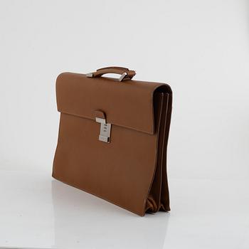 Prada, a briefcase.