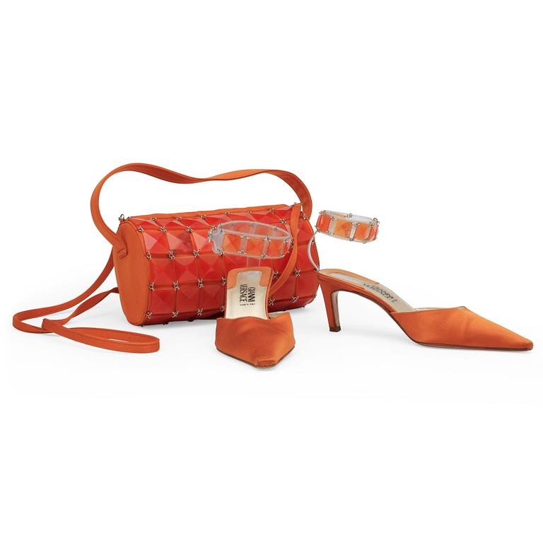GIANNI VERSACE, a pair of orange lady's shoes and a handbag.
