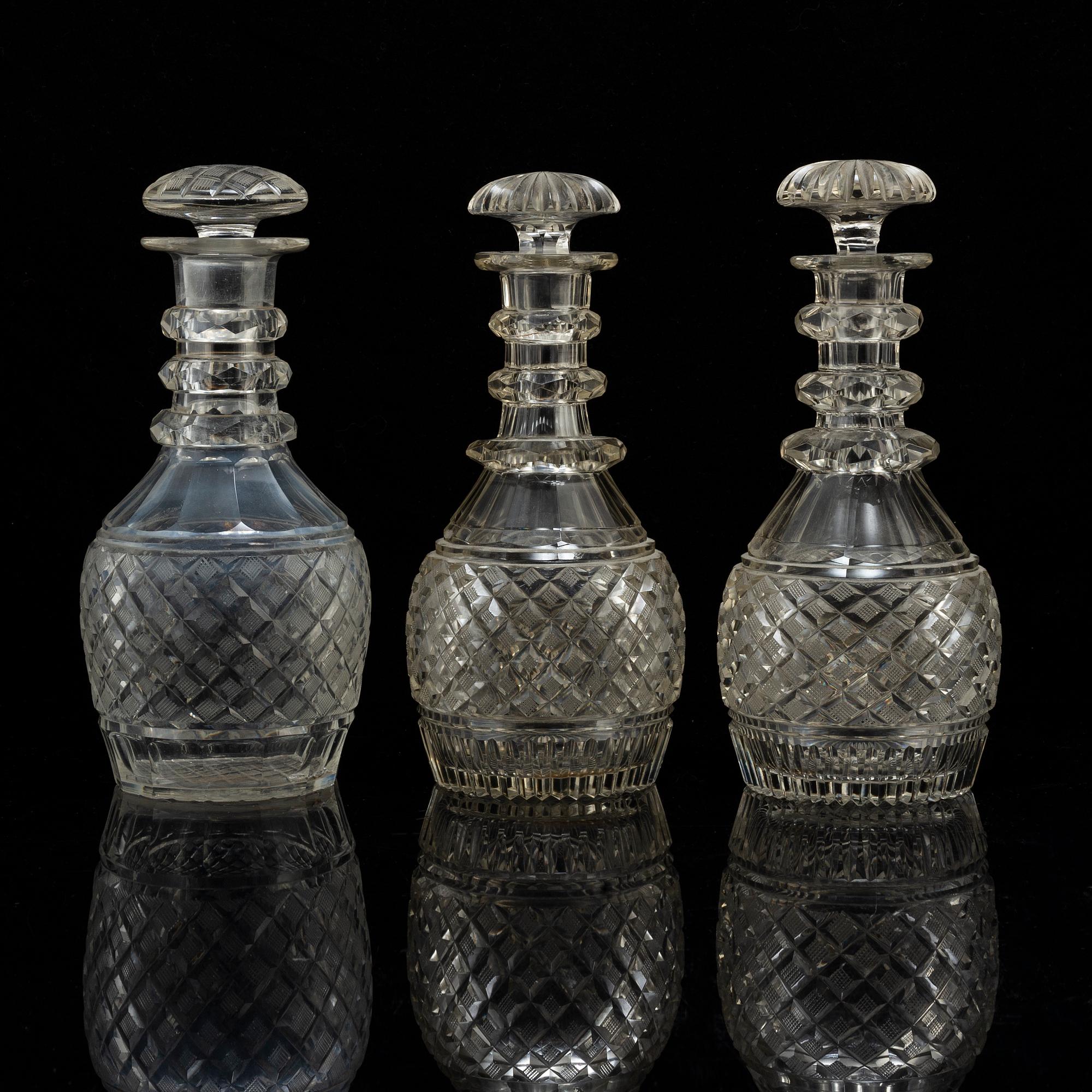 Three late 19th century glass decanters.