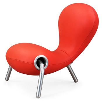 116. A Marc Newson coral red neoprene 'Embryo Chair,
