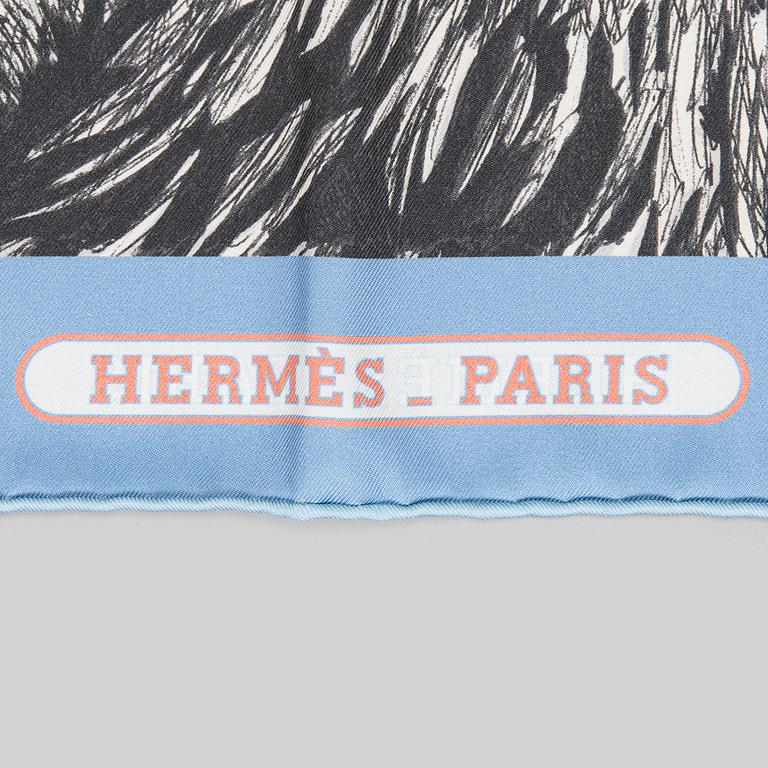 Hermès, a 'Tigre Royal Double Face' silk scarf.
