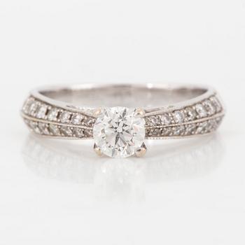 RING, 18K white gold with a round diamond 0.51 cts and small diamonds totally 0.56 cts, weights according to information.