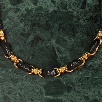 A necklace by CÉLINE.