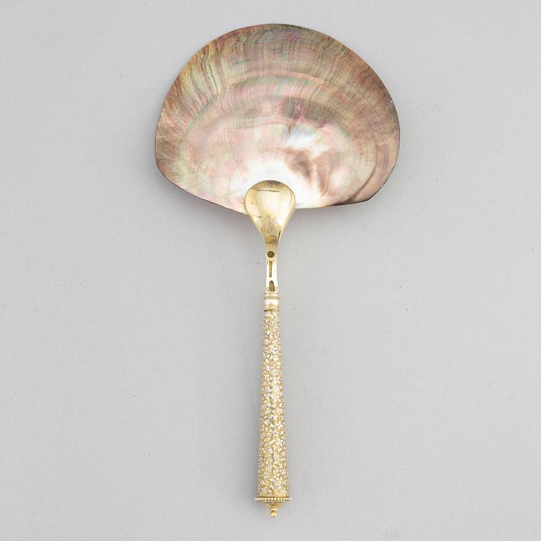 A silver and mother of pearl serving spoon, P. Hertz, Copenhagen, Denmark, 1885.