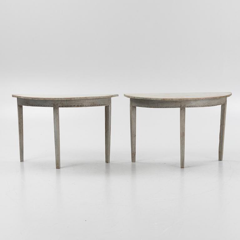 A painted pair of side tables, 19th Century.