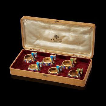 857. Aﾠsetﾠof sixﾠFabergé silver-gilt and cloisonnéﾠenamelﾠ miniature kovshi,ﾠworkmaster Feodor Rückert, Moscow 1908-1917.