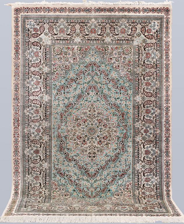 An Oriental silk rug, approx. 154 x 91 cm.