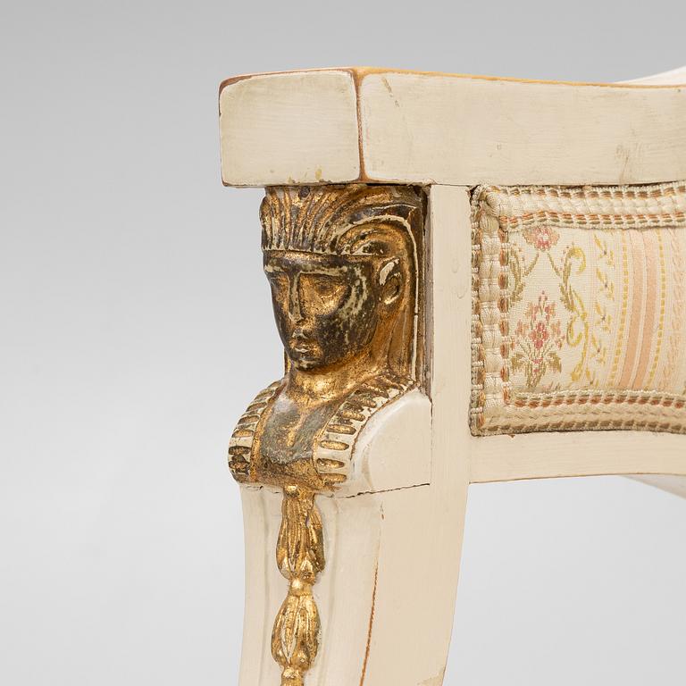 A pair of chairs and an armchair, late Gustavian style, early 20th century.