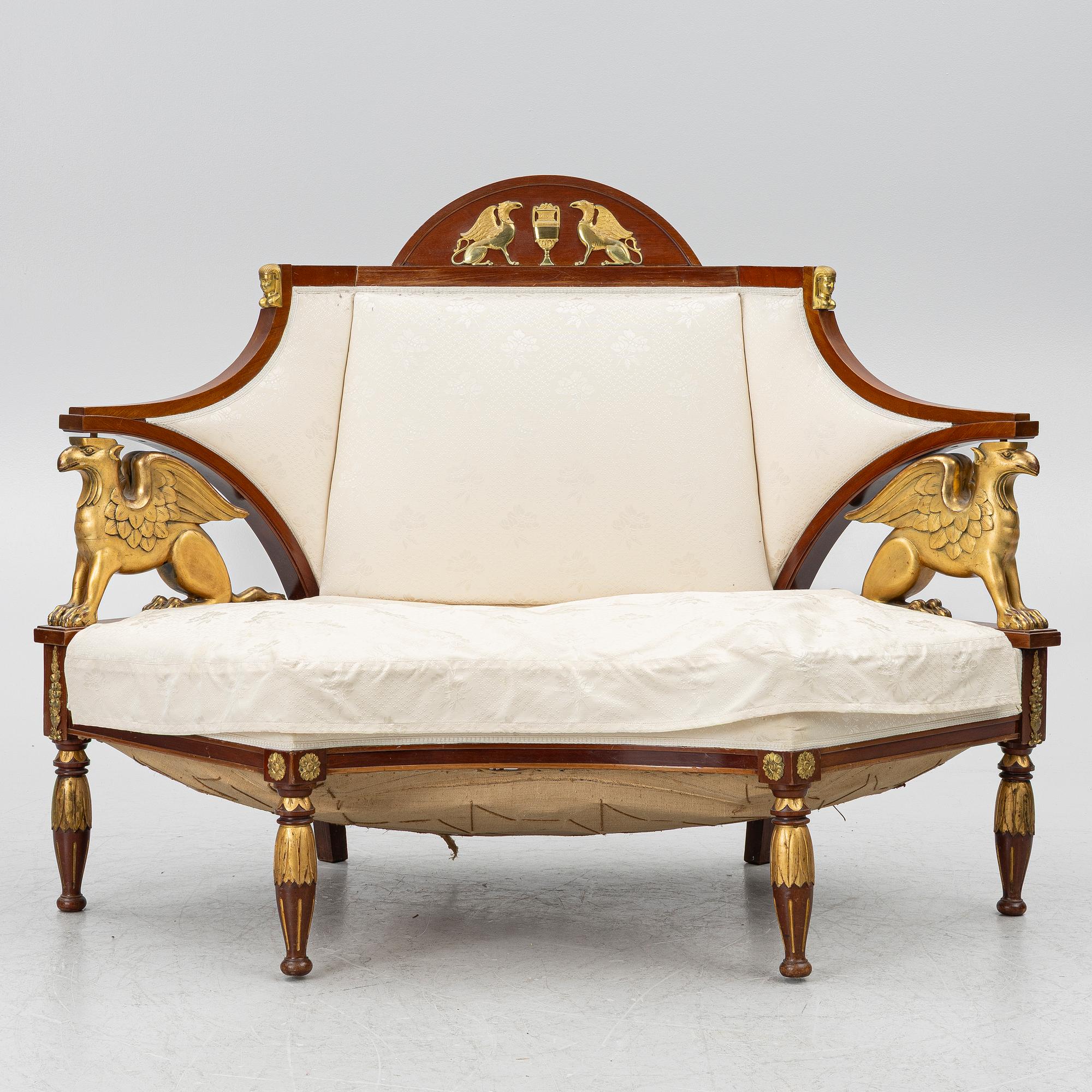 An Empire-style sofa, around 1900.