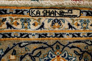 A Keshan rug, signed, ca 370 x 268 cm.