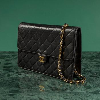 A handbag by Chanel.