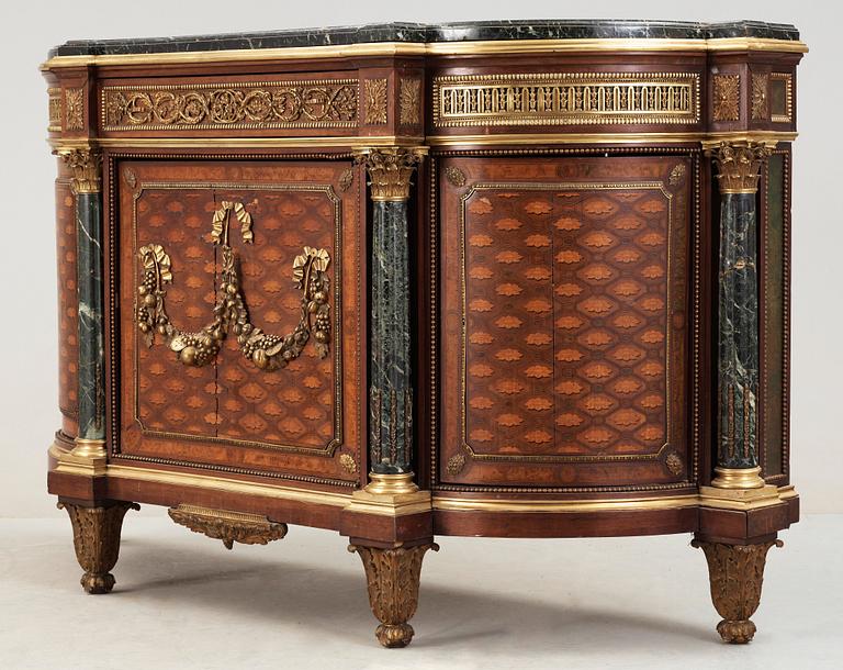 A Louis XVI-style 19th century commode.