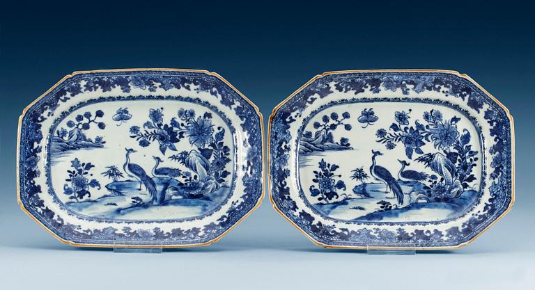 A pair of blue and white 'double peacock' serving dishes, Qing dynasty, Qianlong (1736-95). (2).