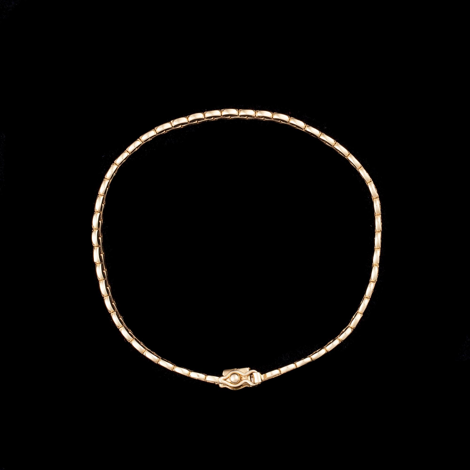 ARMKED, 14K guld. Kellomiehet 1976. Vikt ca 11,0 g.