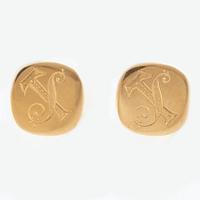Shirt buttons, 18K gold with monogram.
