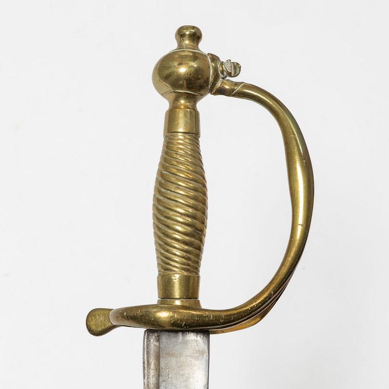 A Swedish police sabre and cutlass, with scabbards.