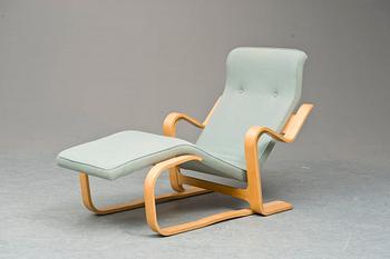 A Marcel Breuer Lounge Chair for Isokon, England. Laminated beech, upholstered in a green fabric.