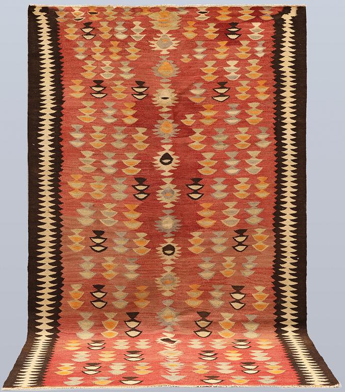 A rug, Persian Nomad Kelim, approx. 280 x 165 cm.