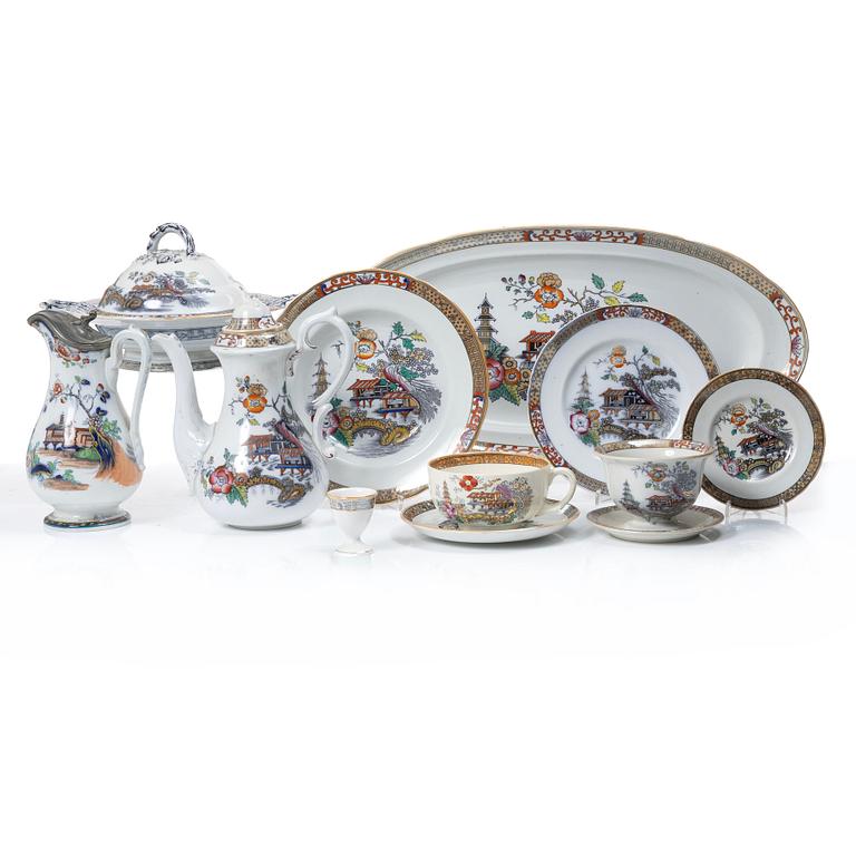 A Swedish "Japan" creamware dinner service, Rörstrand, 1866-1925. (c. 80 pieces).
