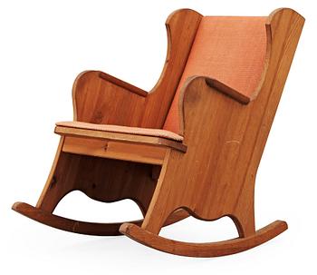 625. An Axel Einar Hjorth 'Lovö' stained pine rocking chair Nordiska Kompaniet, 1930's.