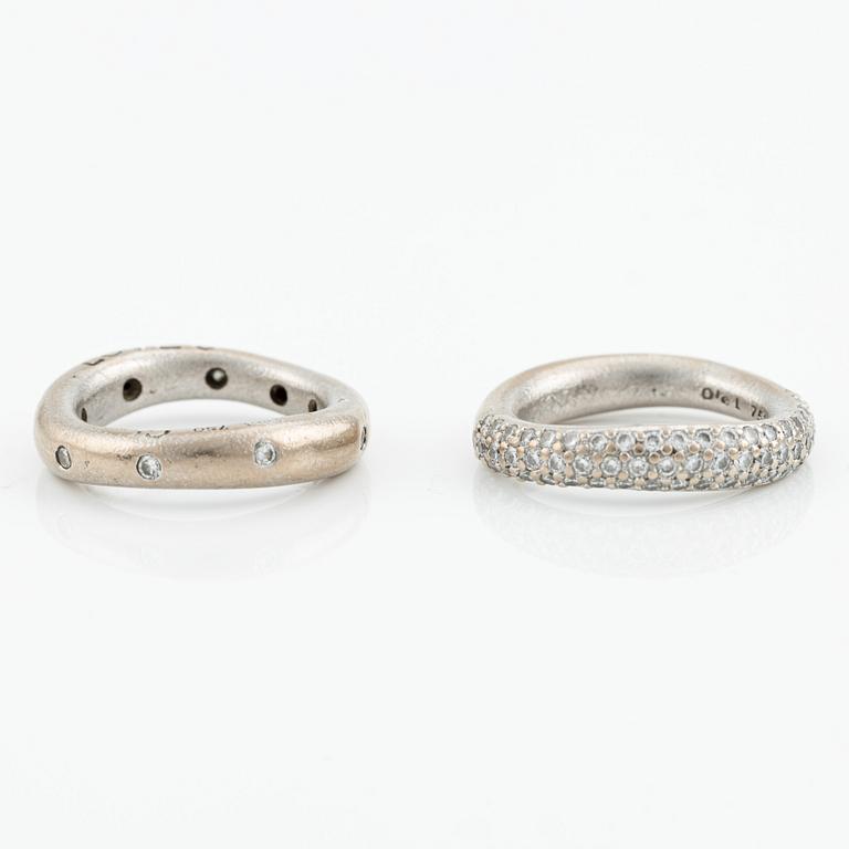 Ole Lynggaard two "Love" rings no. 4 in 18K white gold with round brilliant-cut diamonds.