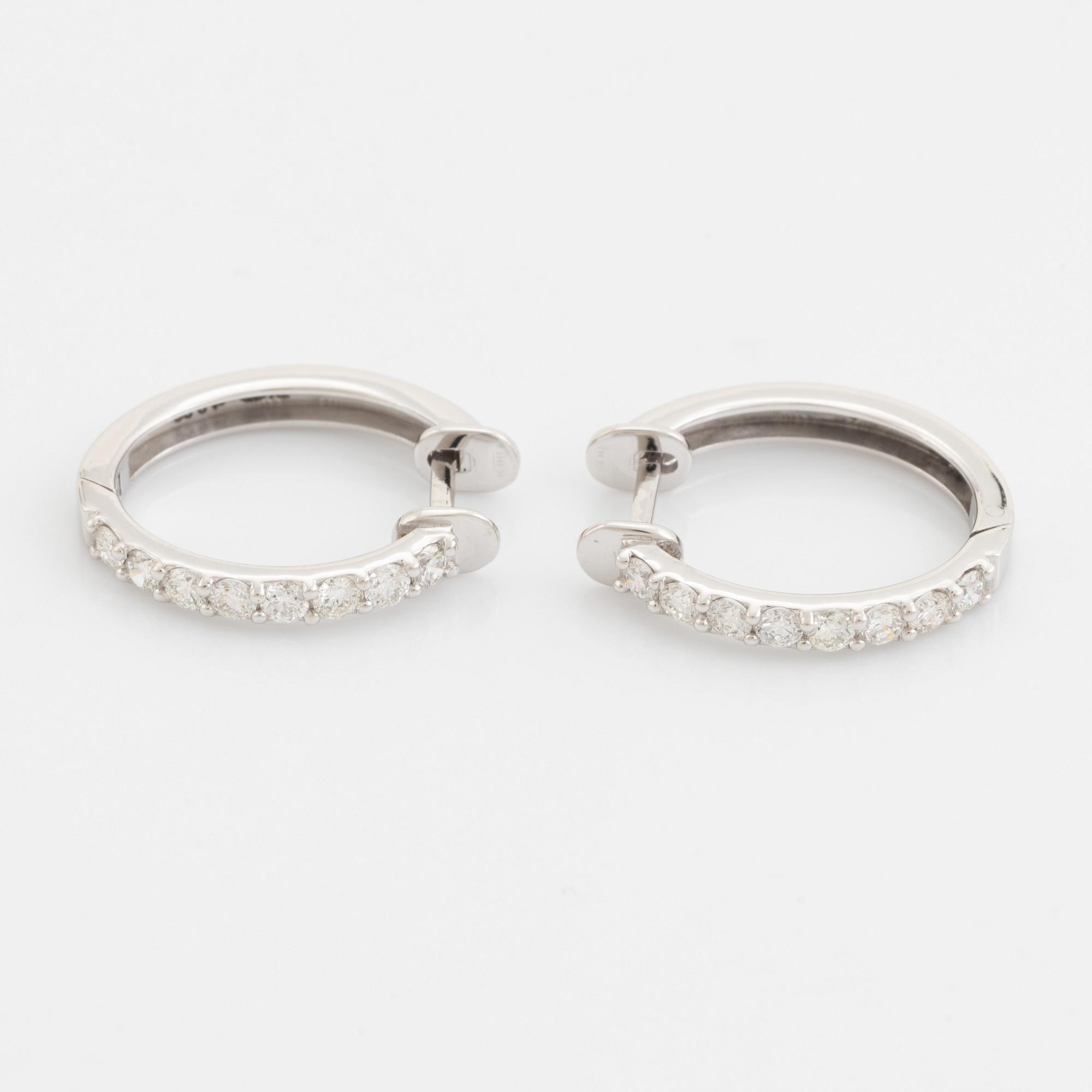 Brilliant cut diamond hoop earrings.