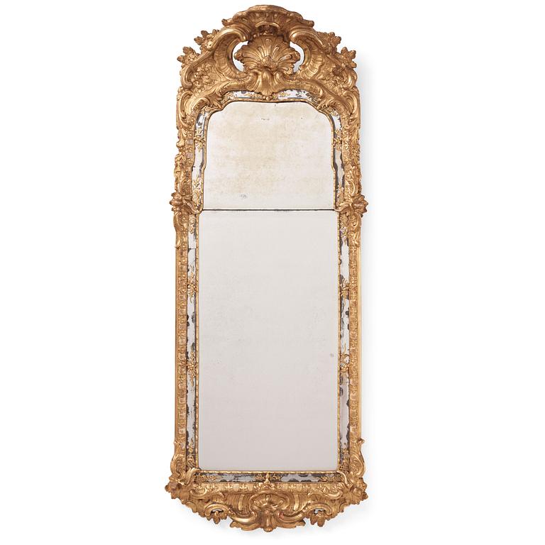 A Swedish rococo giltwood mirror, later part of the 18th century.